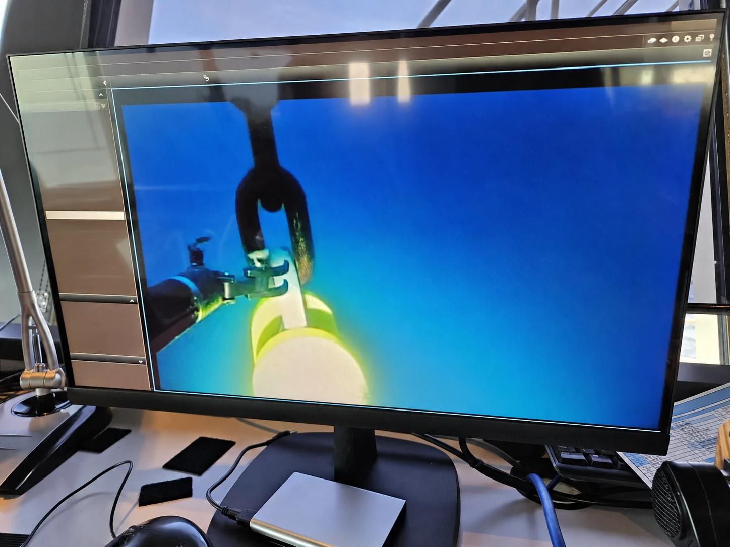 An ROV camera view displayed on a monitoring screen during an offshore operation