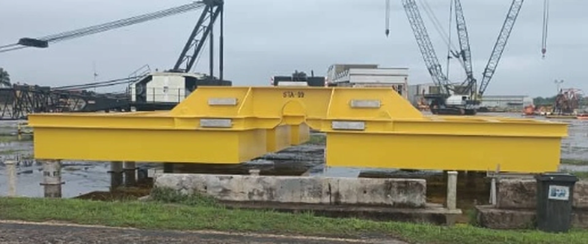 Yellow offshore steel assembly in a fabrication yard